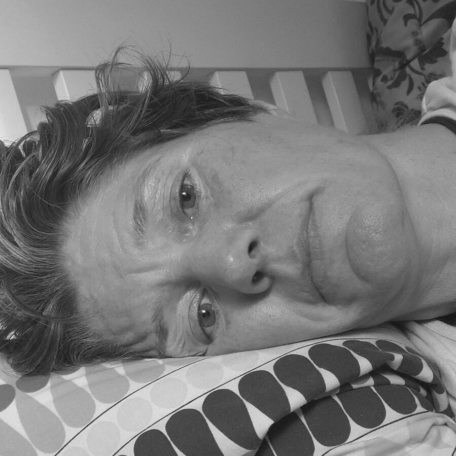 Me lying down looking a bit miserable